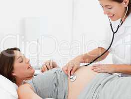 Pregnant woman with a nurse