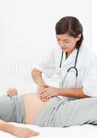 Pregnant woman with a nurse