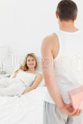 Man offering present to his girlfriend