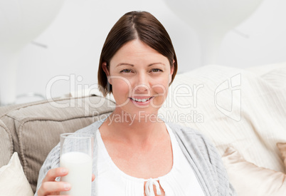 Pregnant woman drinking milk