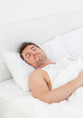 A man in his bed before waking up