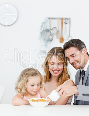 Family having breakfast together