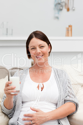 Pregnant woman drinking milk