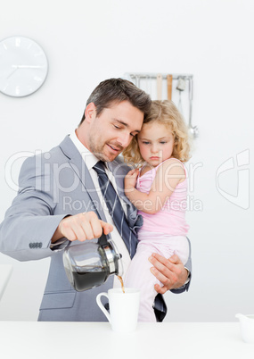 Father having breakfast with her daughter