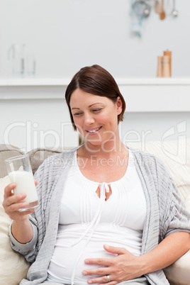 Pregnant woman drinking milk