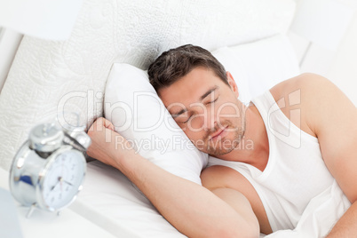 A calm man in his bed before waking up