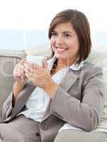 Businesswoman drinking coffee