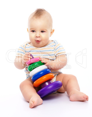 Little boy play with toys