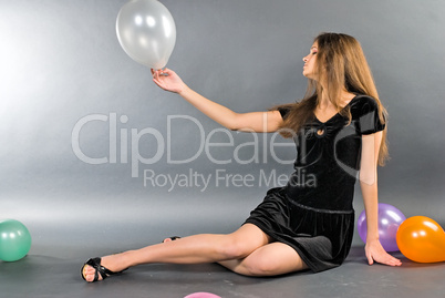 Woman with balloons