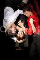 red woman in mask and two men - love triangle