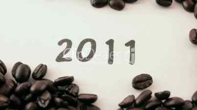 new year.  written on white under coffee