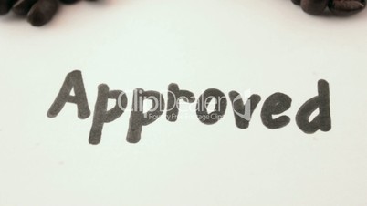 Approved. written on white