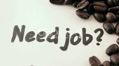 Need job.  written on white under coffee