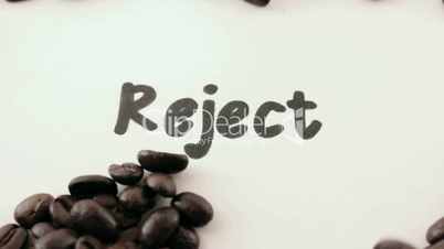 reject.  written on white under coffee