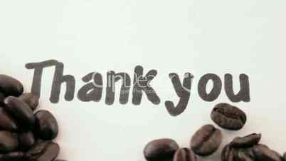 thank you. written on white under coffee