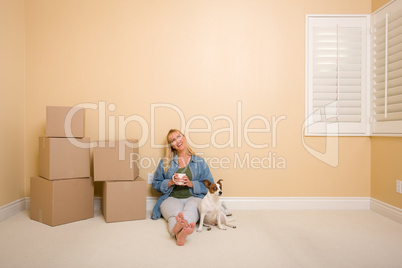 Relaxing Woman and Dog Next to Boxes on Floor