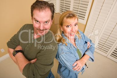 Goofy Couple and Moving Boxes in Empty Room