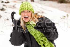 Attractive Woman Having Fun in the Snow