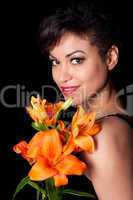 Young Beautiful Woman Holding Lily Flowers
