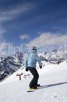 Snowboarder on ski slope