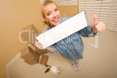 Woman and Doggy with Blank Sign Near Moving Boxes