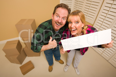 Goofy Goofy Thumbs Up Couple Holding Blank Sign Surrounded by Bo