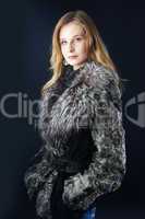 Attractive woman in fur coat