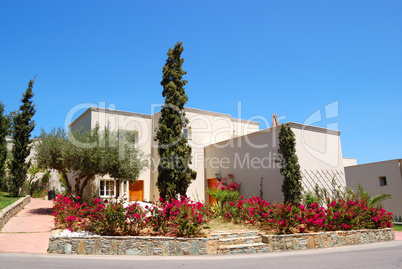 Luxury villa decorated with flowers, Crete, Greece
