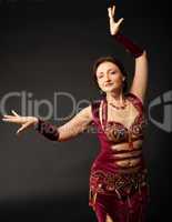mature woman dance in arabic costume