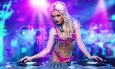 sexy blonde dj girl  in the club