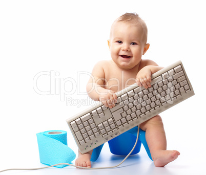 Little child with keyboard