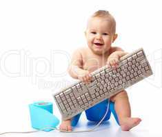 Little child with keyboard