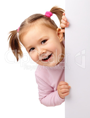 Cute little girl with blank board