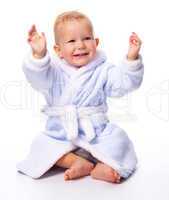 Cute child in bathrobe