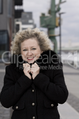 Attractive business lady in front of office scene