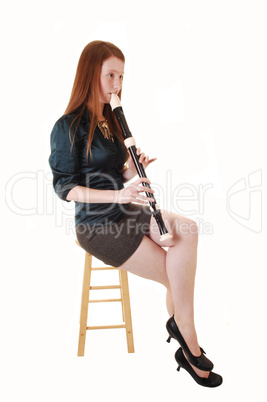 Girl playing flute.