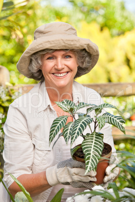 Smiling woman in her garden