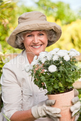 Smiling woman in her garden