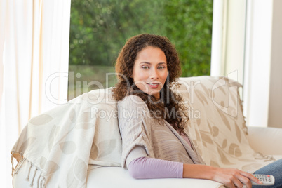 Woman with her remote