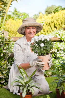 Smiling woman in her garden