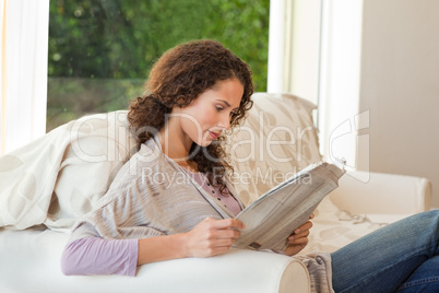 Woman reading the newspaper