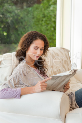 Woman reading the newspaper