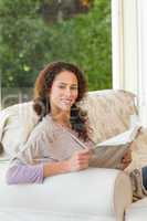 Woman reading the newspaper