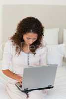 Attractive woman working on her laptop