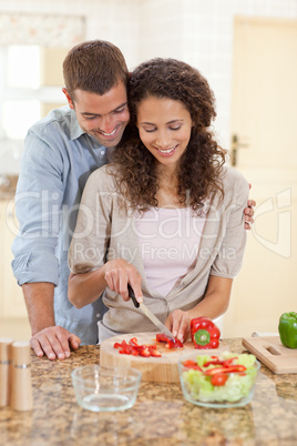 Handsome man cooking with his girlfriend