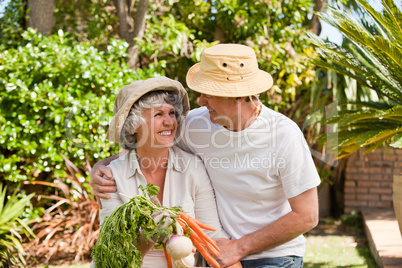 Lovely couple with vegetables