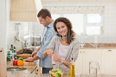 Handsome man cooking with his girlfriend