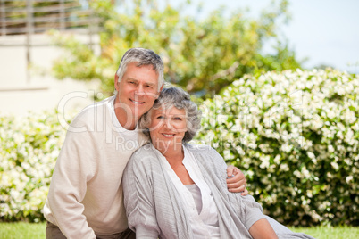 Retired couple looking at the camera