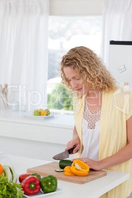 Attractive woman cooking at home