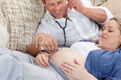 Couple lying down on the couch